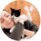Client Testimonial with a woman holding her Tuxedo Cat | Cat Behaviorist | Mieshelle Nagelschneider